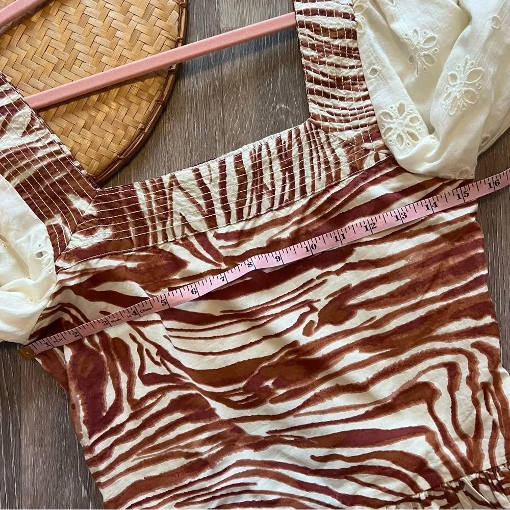 Anthropologie love the label‎ zebra laser cut puff sleeve smocked blouse